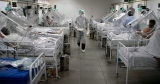 Varianta Omicron se răspândește și îmbolnăvește tot mai mulți oameni, spitalele riscând să funcționeze la capacitate redusă 